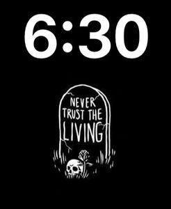 Never trust the living by Lauren